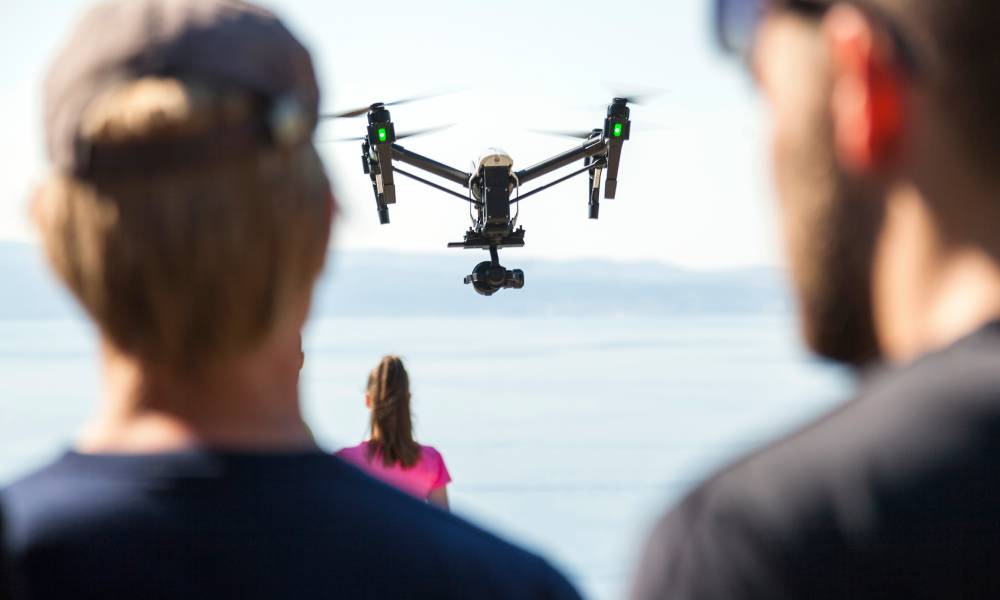 Drone pilot preparing for cinematic aerial shoot in Rwanda